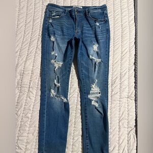 Abercrombie & Fitch The Super Skinny Mid-rise distressed Jeans
